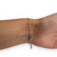 Brazalete de acero con 3 pequeños corazones plateados