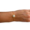 Armband aus goldenem Stahl, glänzender Sonne