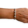 Armband aus starren Kugeln aus Strass und Kupfer