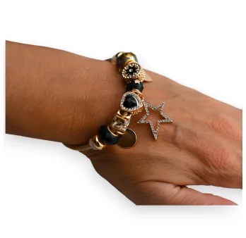 Brazalete de encantos rígido dorado y negro estrella