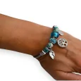 Brazalete de encantos rígido plateado y turquesa árbol de la vida