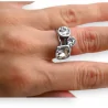 Ring aus Stahl mit 3 weißen Steinen