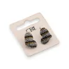 3D heart-shaped earrings with rhinestones