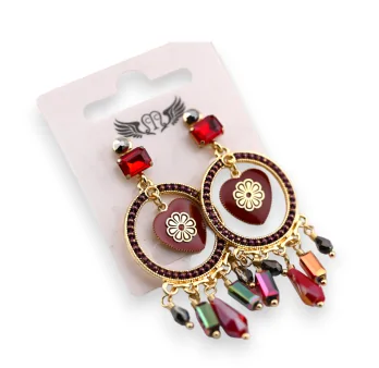 Fancy dangling gold earrings with a burgundy heart