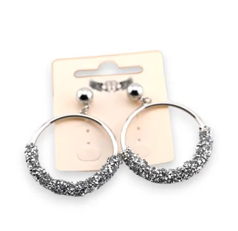 Silver round fancy earrings with sparkling stones