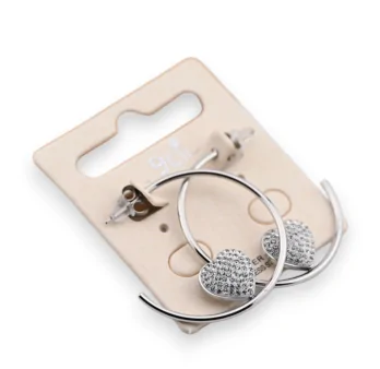 Half hoop earring made of silver steel with a heart-shaped rhinestone