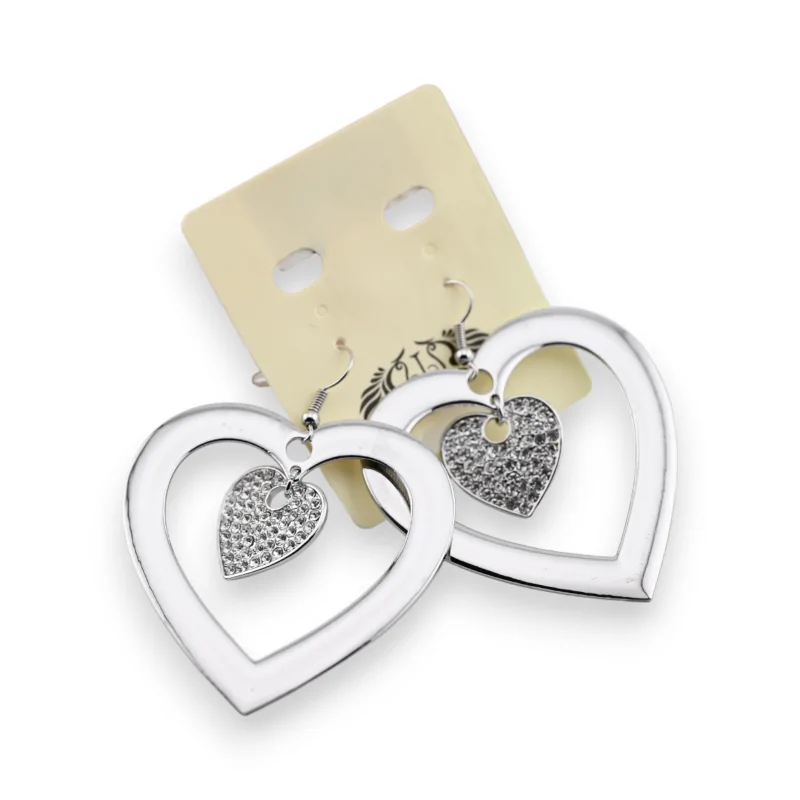 Fancy silver earring with a big heart