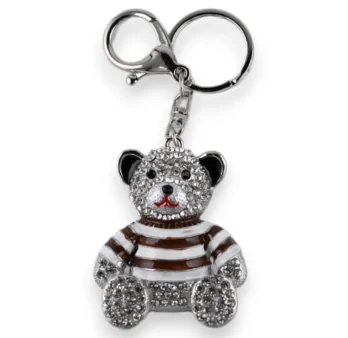 Silver teddy bear keychain with brown striped shirt