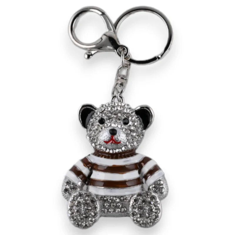 Silver teddy bear keychain with brown striped shirt