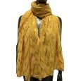 Mustard-colored fluid scarf adorned with gilding