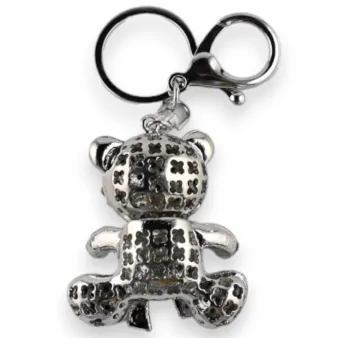 Silver teddy bear keychain with white bow
