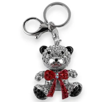 Silver teddy bear keychain with red knot