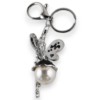 Silver fairy keychain with dark blue rhinestones
