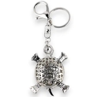 Silver turtle keychain with black and white rhinestones
