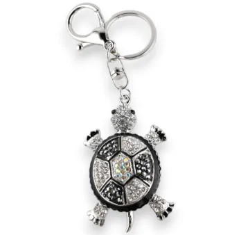 Silberner Schlüsselbund mit schwarz-weißen Strass-Schildkröte Silberner Schlüsselbund mit schwarz-weißen Strass-Schildkröte