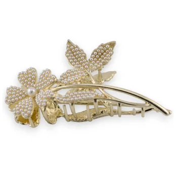Golden hairclip with flower on its pearl stem