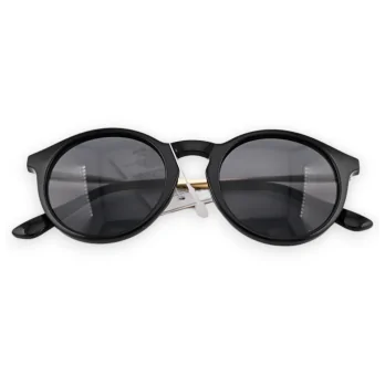 Round black and gold glasses