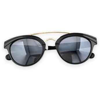 Runde Designbrille mit schwarzem Rahmen und goldenem Quersteg
