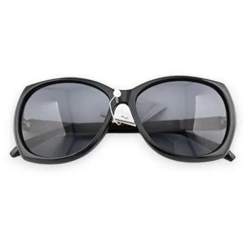 Sonnenbrille, großes Modell, golden verzierte Bügel Sonnenbrille, großes Modell, golden verzierte Bügel