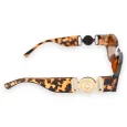 Occhiali rettangolari leopardo marroni montature larghe gioielli dorati