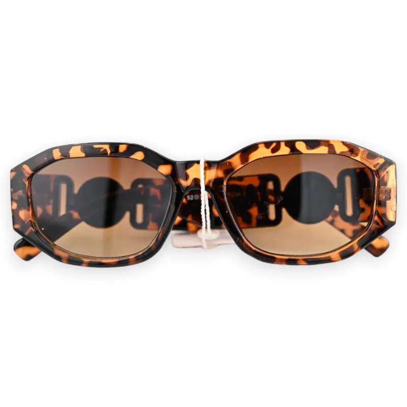 Rechteckige Sonnenbrille mit Leopard-Muster, braunen Bügeln und breiten goldenen Schmuckstücken