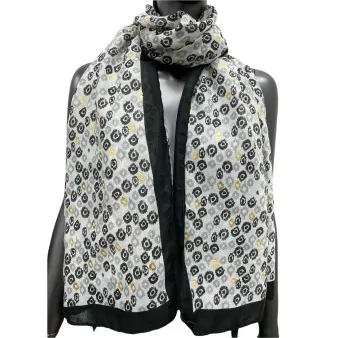 Ethnic scarf with golden details in white and black