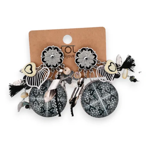 Fantasy clip-on earrings with black and white charms
