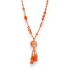 Long necklace orange medallion tree of life