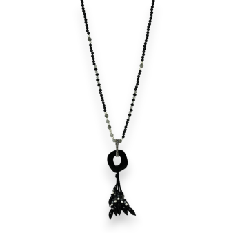 Black long necklace with resin medallion and assorted charms