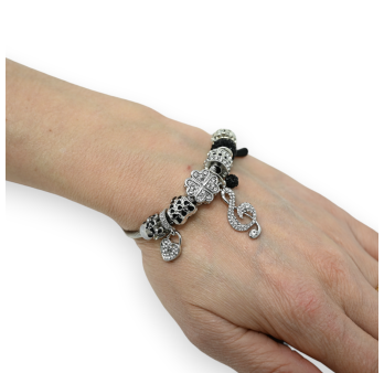 Silver and black rigid charm bracelet with a treble clef