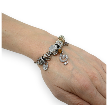 Silver and brown rigid charms bracelet with treble clef