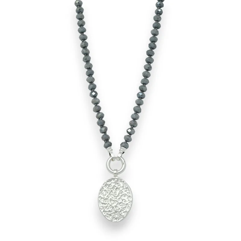 Fancy necklace with shiny grey pearls and brushed silver medallion