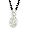 Fancy necklace with shiny black pearls and brushed silver medallion