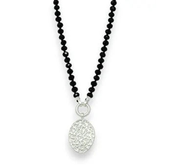 Fancy necklace with shiny black pearls and brushed silver medallion
