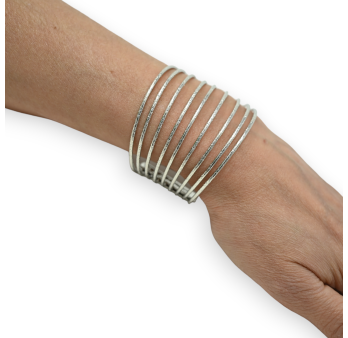 Silver cuff bracelet with fine openwork strips