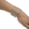 Silver cuff bracelet with fine openwork strips