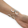 Silver cuff bracelet with round pattern