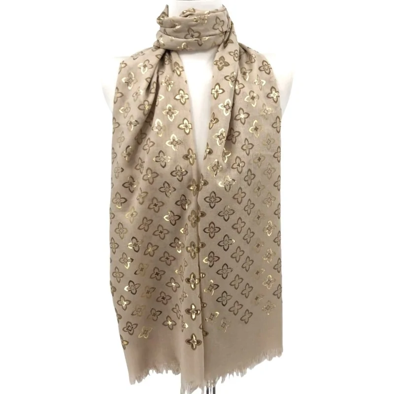 Thin beige scarf with golden flower prints