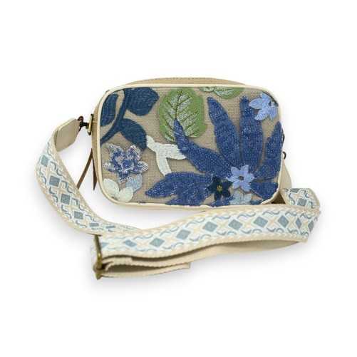 Rigid shoulder bag with blue flower embroideries