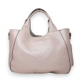 Large soft handbag with its metallic pink accessories