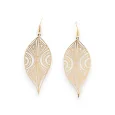 Gold metal earrings with ethnic pattern