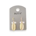 Gold metal earrings with oval beige medallion by Ikita