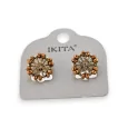 Pendientes de metal dorado con flor y perlas marrones marca Ikita