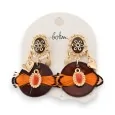 Golden earrings with orange feathers by BOHM