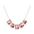 Geometric rose gold-plated costume necklace with red hues by Ikita