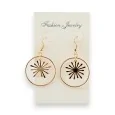 Gold hoop earrings with sun pattern