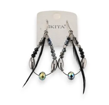 Boucles d'oreilles plume noire de chez Ikita