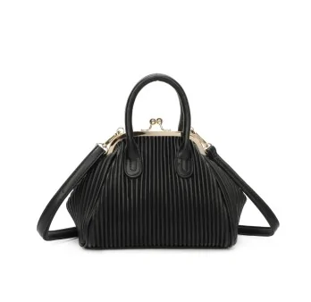 Bolso de mano vintage negro con cierre de botón dorado