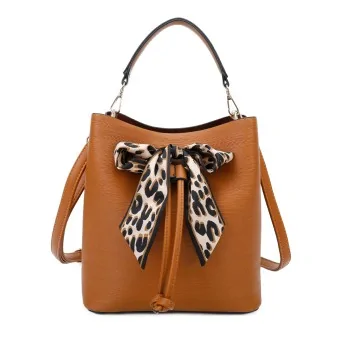 Elegant camel-colored rigid handbag with leopard print bow