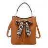 Elegant camel-colored rigid handbag with leopard print bow